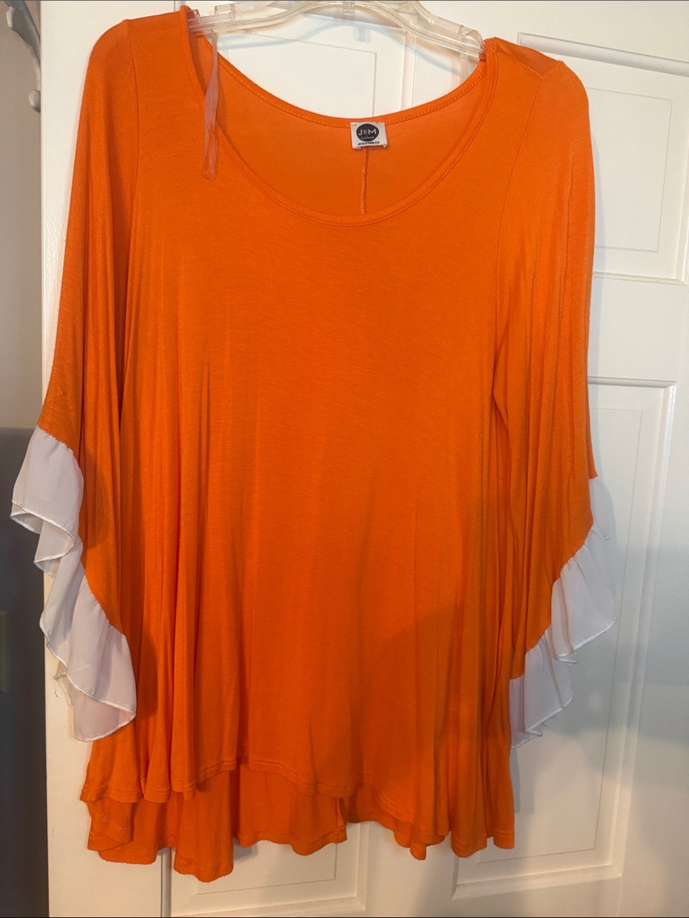 Flowy Orange Ruffle Sleeve Tunic with White Accent